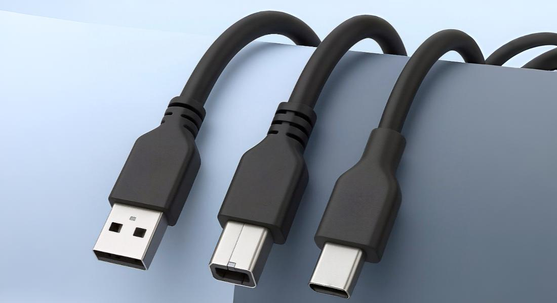 USB-A-, USB-B- og USB-C-kabler i sort - alsidige tilslutningsløsninger til dataoverførsel og strømforsyning mod en lyseblå baggrund